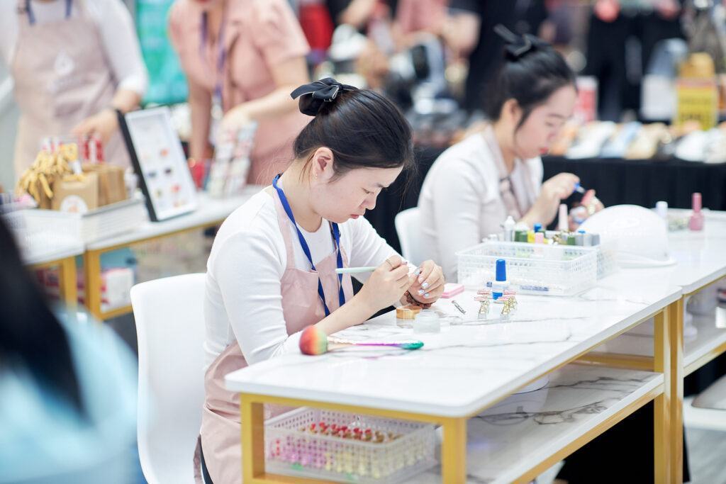 Nail Technician showcasing Press-on Nails