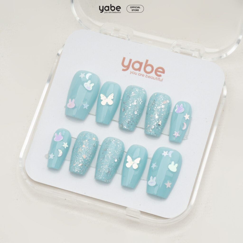 Elegant navy blue winter nails with holographic glitter tips