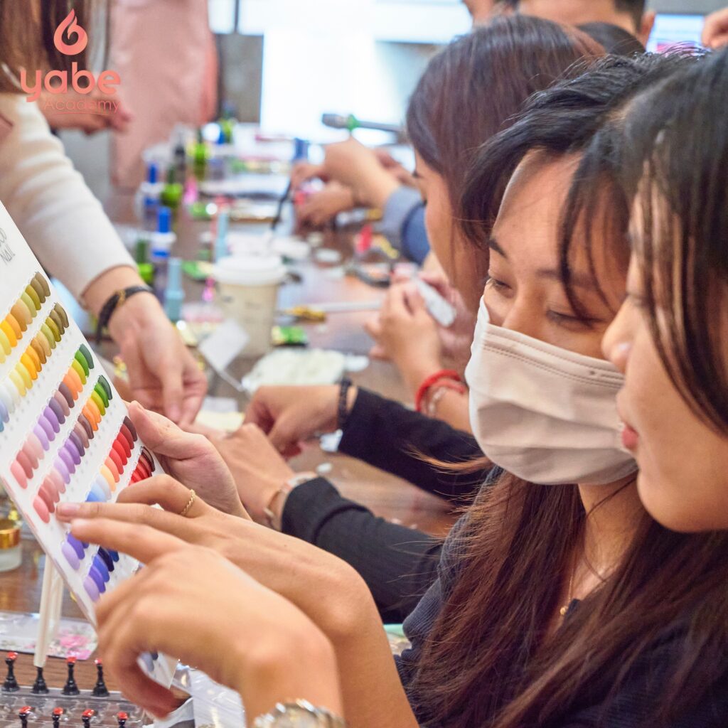 Artisan working on custom handmade press-on nails