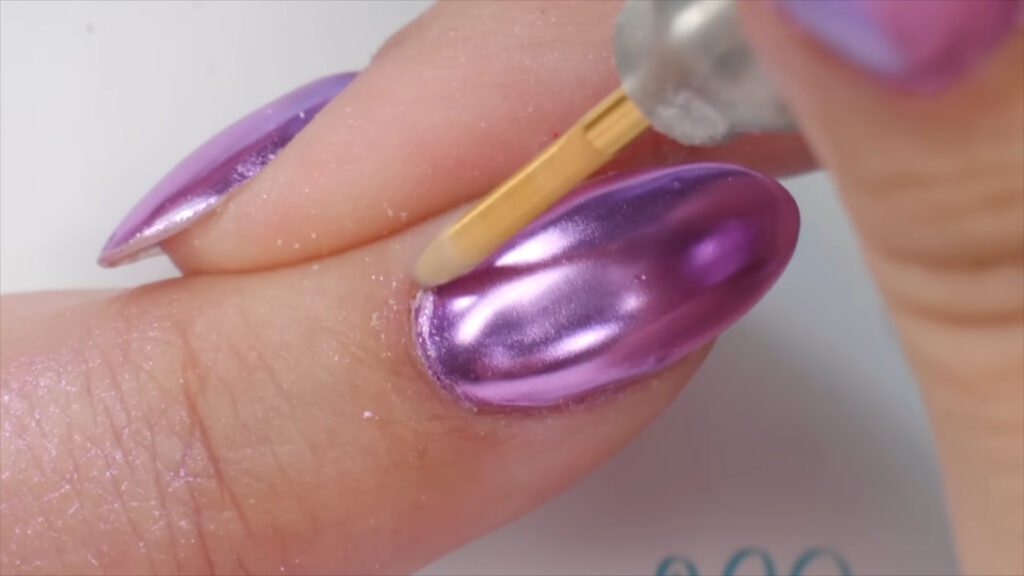 Chrome press-on nails with a mirror finish for a sleek, fashion-forward manicure