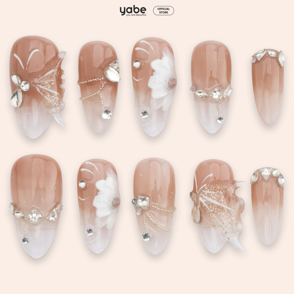 Brown ombre cute nail designs 2026 with warm neutral gradient