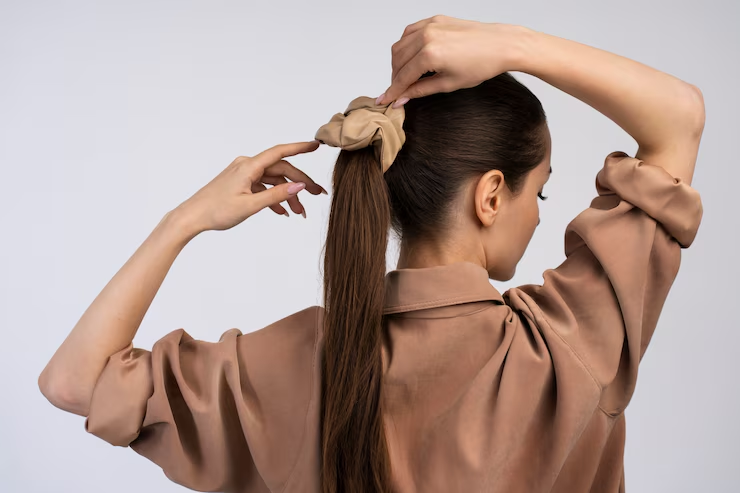 Tying hair is easier when wearing press on nails with the right method