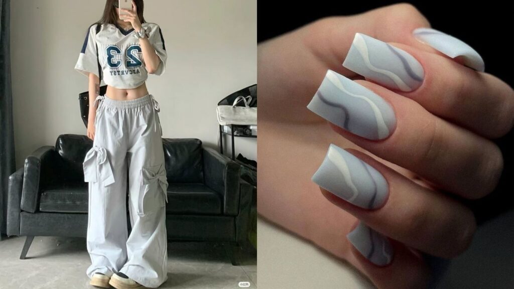Soft neutral nails paired with streetwear