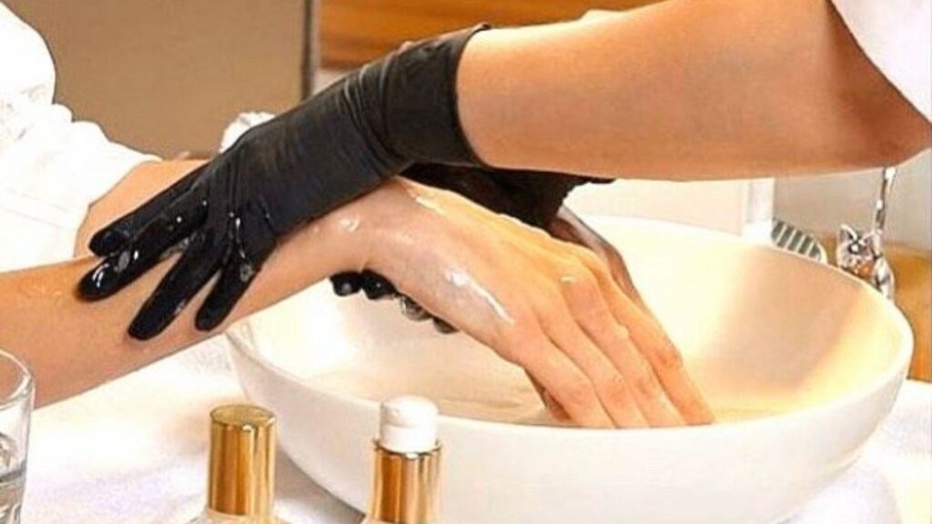Cleaning the nails during the professional manicure steps